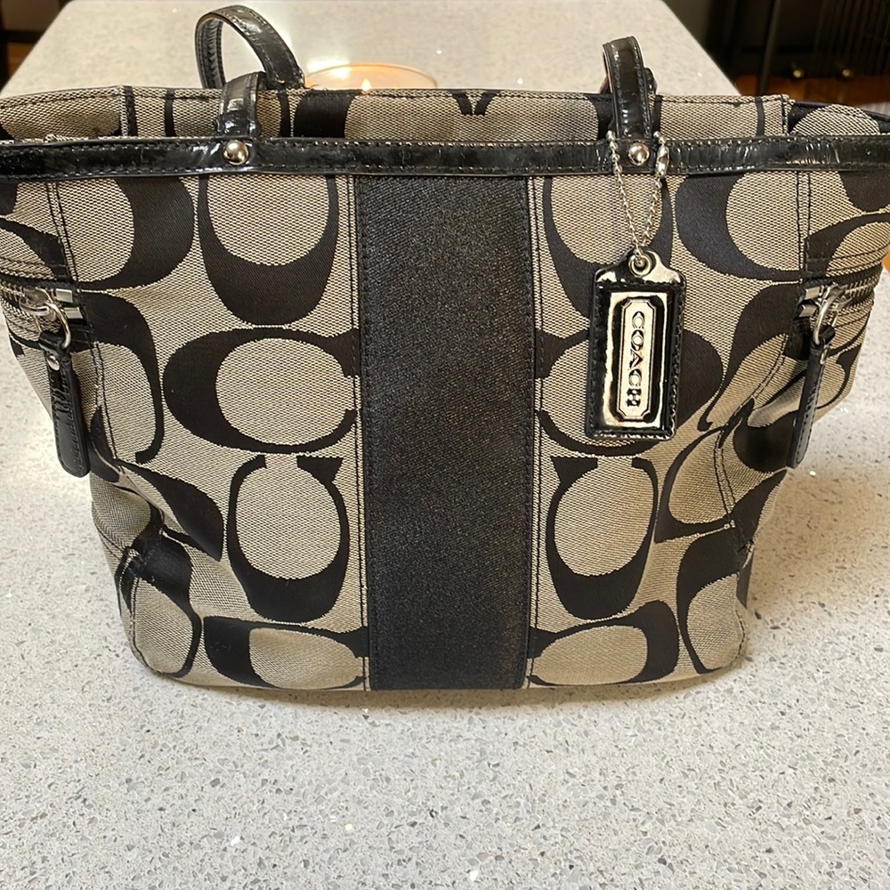 Black and gray Coach bag. 10.5x9x6 .
